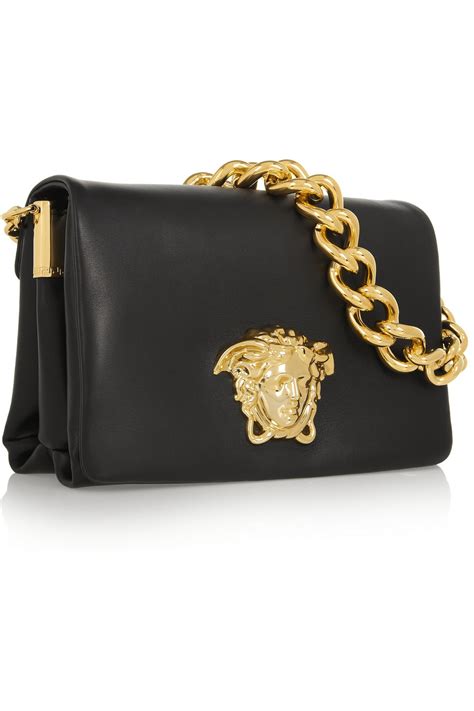 versace black shoulder bag.